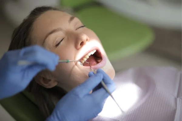 A woman with a perfect white smile from a cosmetic dentist in Stephenville TX